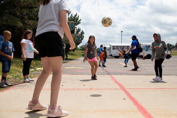 Children played outside at a summer camp in Farmington Hills, Mich., last summer.