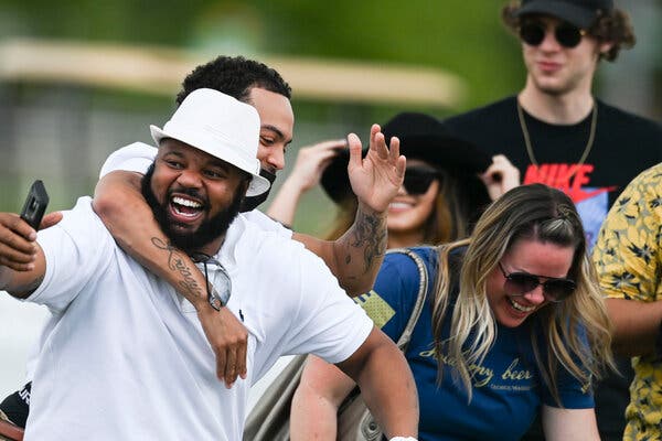 Fans entering the infield for a concert with 2 Chainz, D-Nice and Major Lazer before the 146th running of the Preakness Stakes.