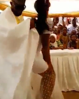 This horny slay queen tried to simulate sex with the groom during a wedding then this happened (VIDEO)