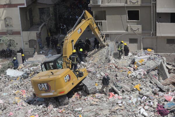 Rescuers working at the site of a building collapse in Cairo in March.