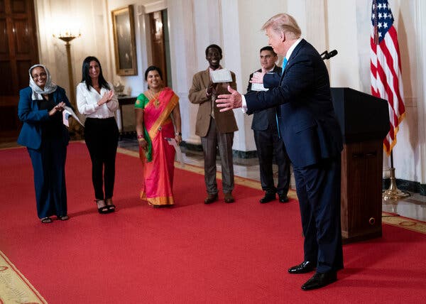 President Donald Trump takes part in a US Naturalizations Ceremony at the White House.