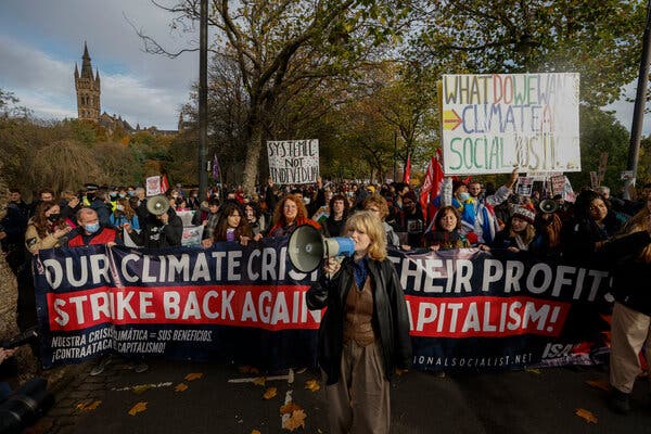 Protesters gathered beside Kelvingrove Park in Glasgow on Friday.