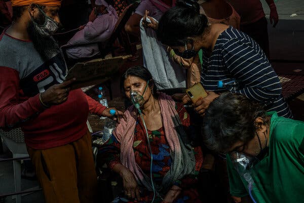 People with breathing problems receiving free oxygen support in Delhi last month.