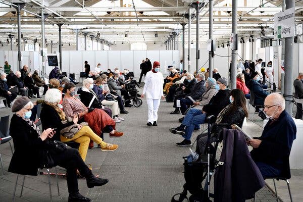 People waited in an observation room after being vaccinated in Copenhagen last month. Officials said the country would do without  the Johnson & Johnson single-shot vaccine.
