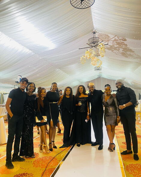 Citizen TV's Lulu Hassan and Rashid Abdalla pose for a photo alongside their colleagues on May 8, 2022.