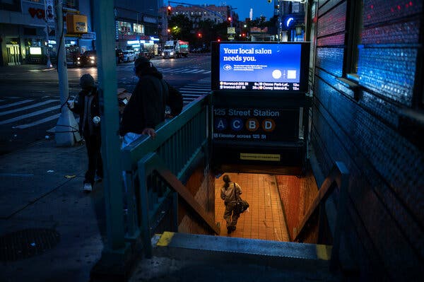 A subway station in Harlem in the early hours of Monday. The United States’ busiest transit system returned to full screeching service early Monday after more than a year of overnight closings for cleaning.