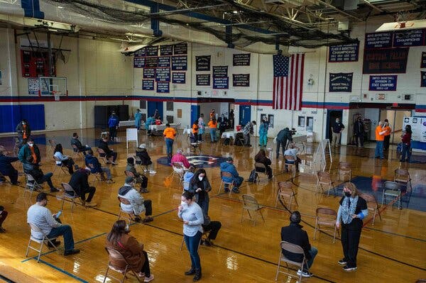 A vaccination site at Central Falls High School in Rhode Island in February. Rhode Island is one of several northeastern states with significantly decreased infection rates and hospitalizations.