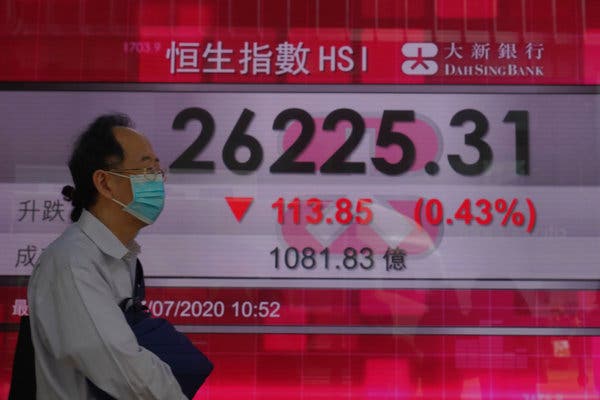 An electronic board showing the Hong Kong share index at the Hong Kong Stock Exchange on Tuesday. Asian shares were mixed Tuesday.