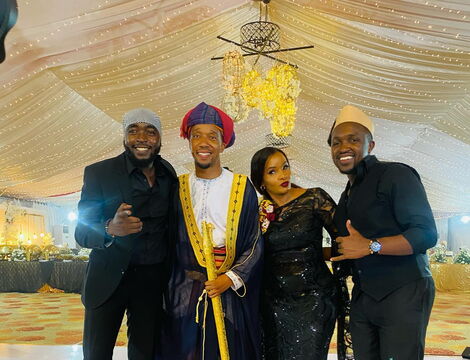 Citizen TV's Lulu Hassan and Rashid Abdalla pose for a photo alongside their colleagues on May 8, 2022.