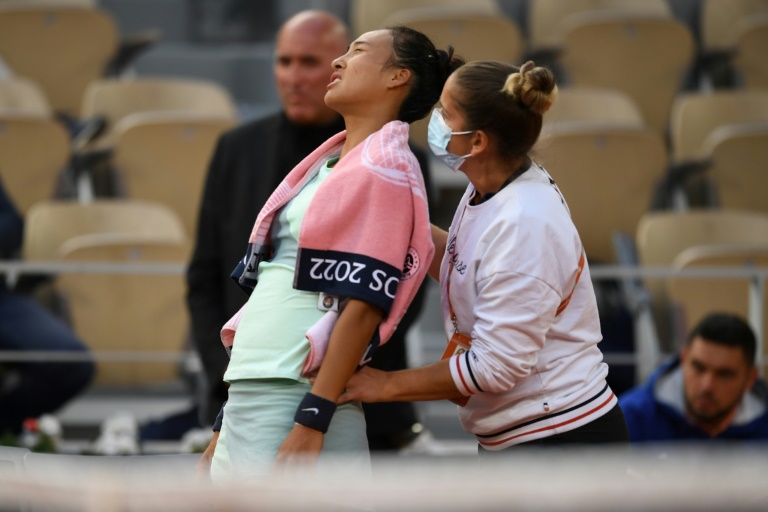 'I wish I was a man,' says China's Zheng as cramps end her French Open bid