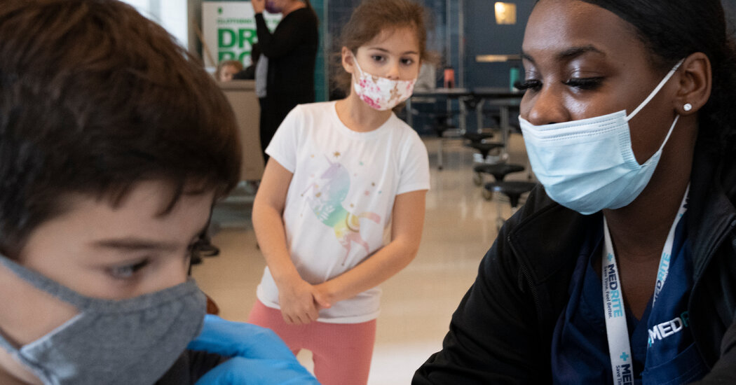 Covid Updates: New York City Schools’ Vaccination Rates Show a Rich-Poor Divide