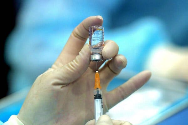 A medical staff member preparing to administer a dose of the Sinovac vaccine at a university in Qingdao, in China’s eastern Shandong Province.