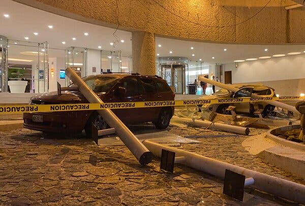 Damaged cars outside a hotel in Acapulco, Mexico, after an earthquake on Tuesday.