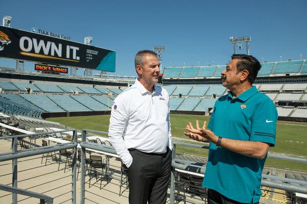 Jaguars Coach Urban Meyer, left, and the team’s owner, Shad Khan, are ready for the franchise’s moment in the spotlight.