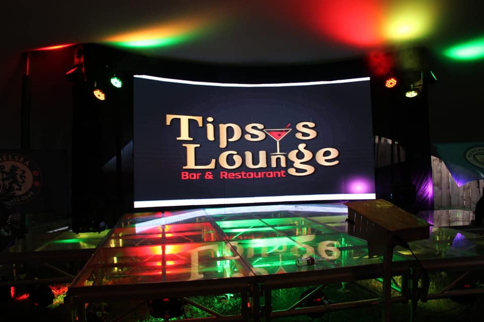 A section of Tipsy's Lounge branded for a past event. 