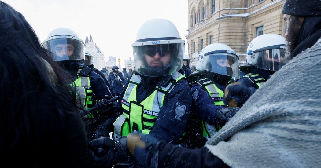 Truckers at Ottawa Protest Arrested at Gunpoint as Police Advance
