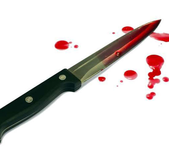 A university student was stabbed as his girlfriend watched.
