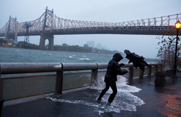 Waves surged onto the pathway along the FDR Drive when Hurricane Sandy hit Manhattan in 2012.