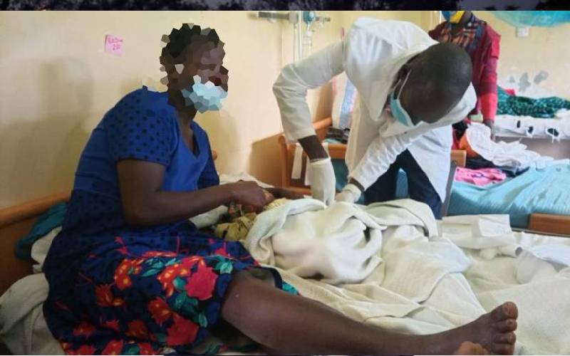 Head teacher accused of throwing baby into fire surrenders to police