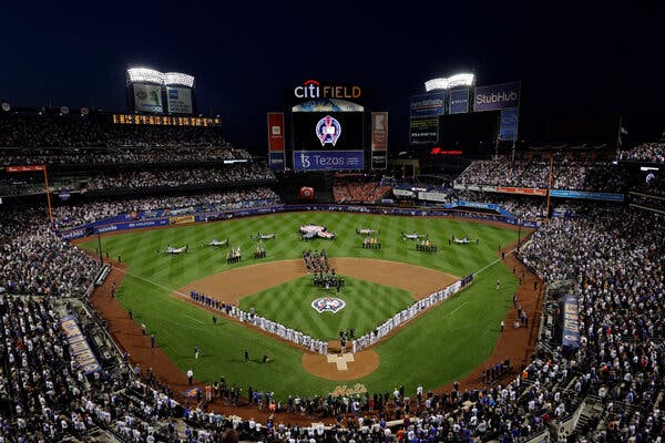 The Mets and Yankees lined up alongside one another during a ceremony at Citi Field.