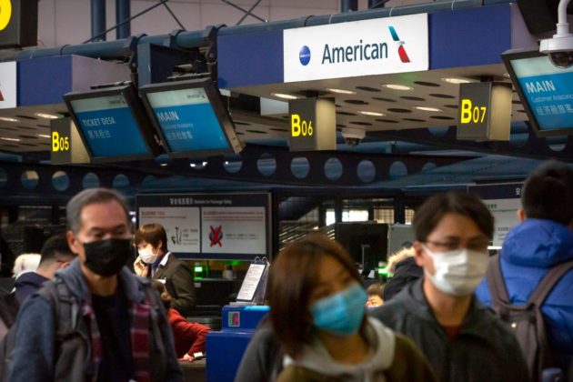 Hong Kong bans flights as Omicron surges