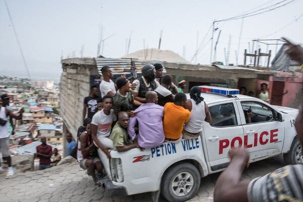 Two men accused involvement in the assassination of the Haitian president being transported Thursday in Port-au-Prince.