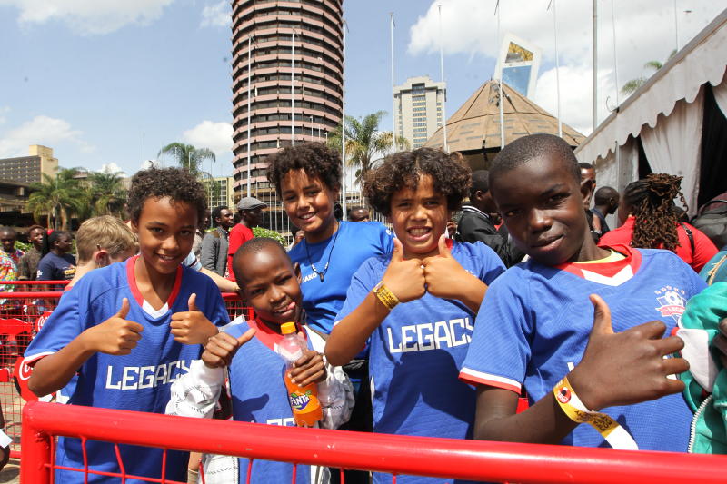 Ecstatic fans enjoy a view of the prized World Cup trophy at KICC : The standard Sports