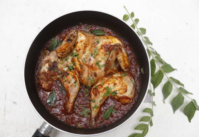 Whole chicken in thick sauce Eve woman