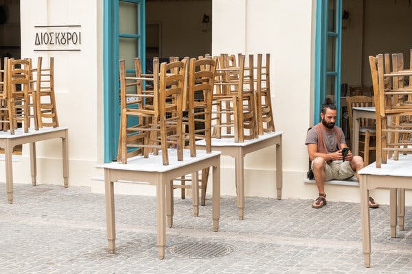 A restaurant in Athens prepared to reopen earlier this month. In countries reliant on tourism, like Greece, many businesses will be burdened by accumulated debt, the European Central Bank said.