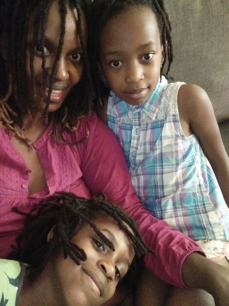Njeri Muchina (in maroon) with her children