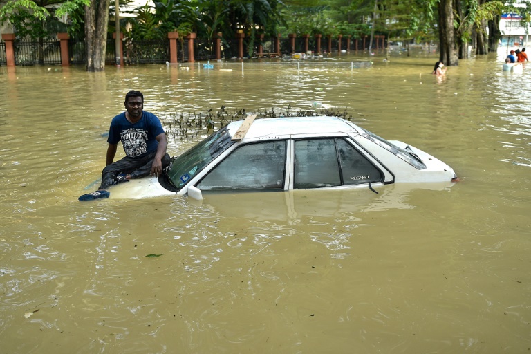14 dead, 70,000 displaced in Malaysian floods » Capital News