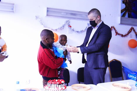 Mozzartbet contributes a bag of goodies to the family of Elizabeth Wanjiku at Waithaka Health Centre, on Monday, November 8.