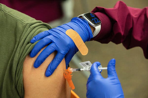 A teenager in San Antonio, Tex., receives the Pfizer vaccine earlier this month.