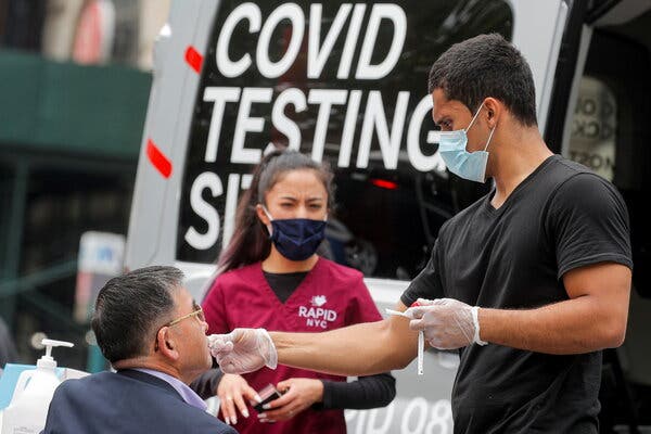 Testing for the virus at a mobile van last month. Coronavirus testing in the city has dropped about 50 percent since April.
