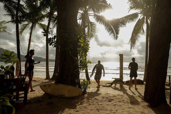 Local residents at a beach on the island of Phuket, Thailand, in April.