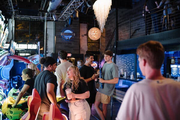 A bar in Columbia, Mo., on Saturday. Guidance from the Centers for Disease Control and Prevention advises even vaccinated people to continue to wear masks in indoor public spaces, including restaurants when they are not actively eating and drinking.