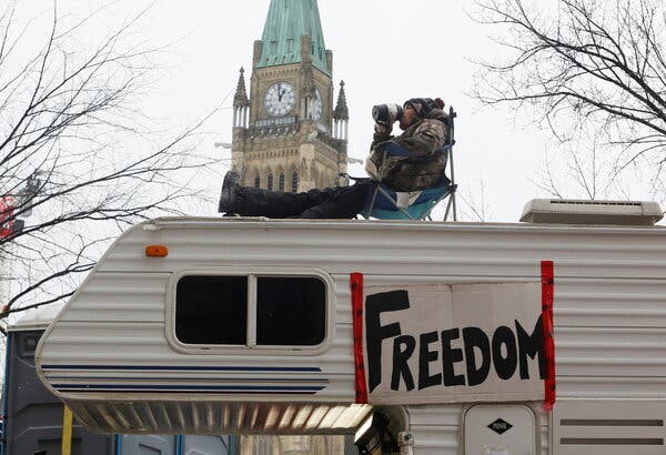 Atop a camper that was parked in front of Parliament Hill in Ottawa, the Canadian capital, on Sunday.