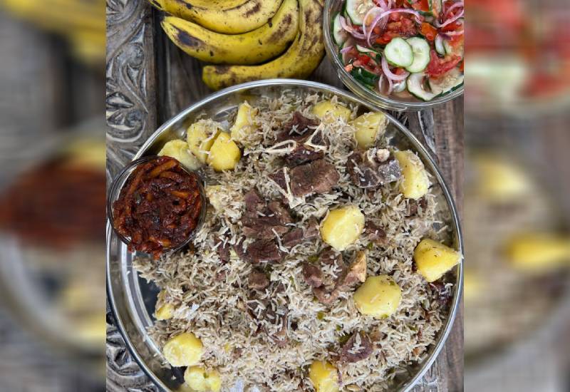 Time for Swahili T-bone pilau Eve woman