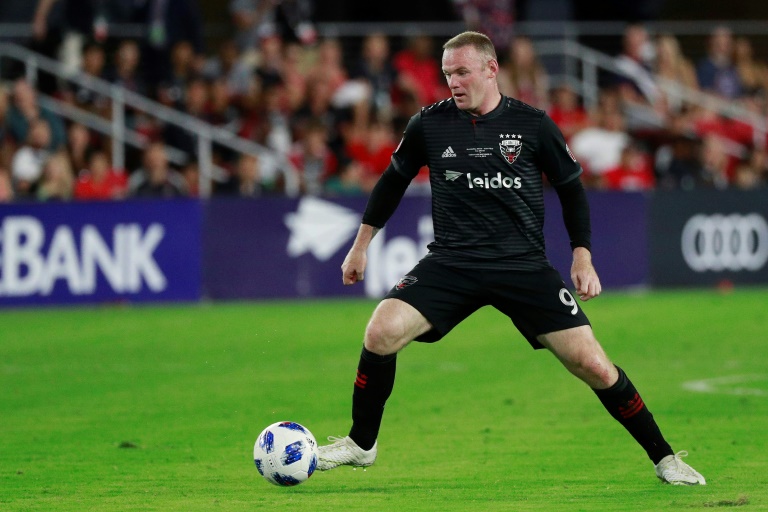 Rooney sees red as Rossi runs riot