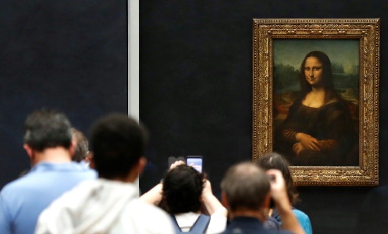 Man arrested after smearing Mona Lisa with cake at Louvre » Capital News