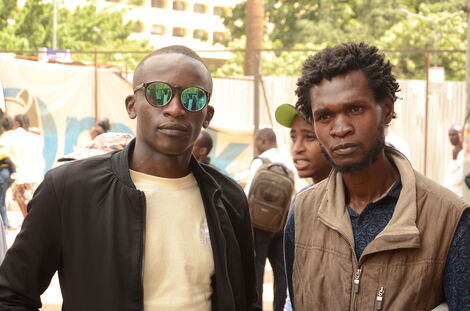 Shinaali Goodwin Lloyd (left) and Simon Nyakundi (right) pose for a photo in May 2022.
