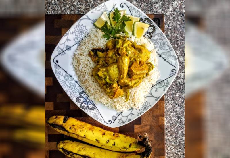 Swahili coconut fish curry Eve woman