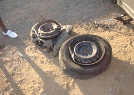 The damaged rims and tyres.