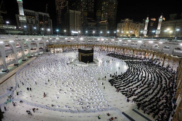 Saying evening prayers around the Kaaba in the holy city of Mecca, Saudi Arabia, on Sunday.
