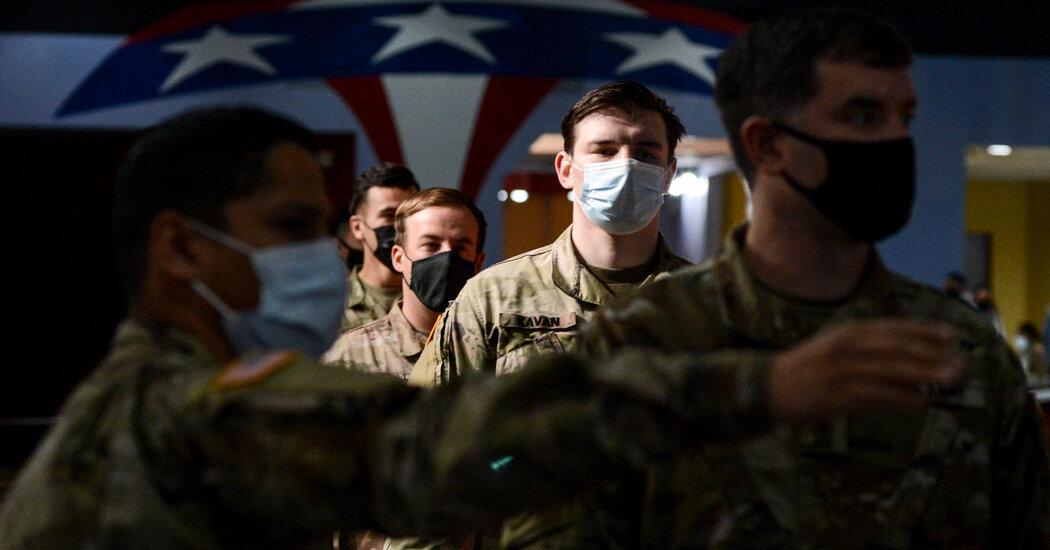 Federal judge blocks the Defense Dept. from punishing Navy forces who refuse the vaccine.