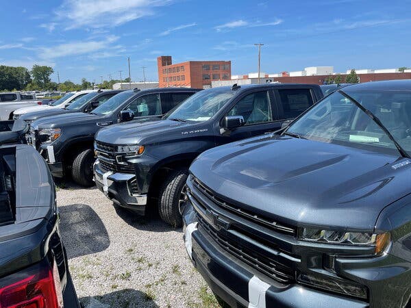 General Motors pickup trucks awaiting missing parts in Fort Wayne, Ind.