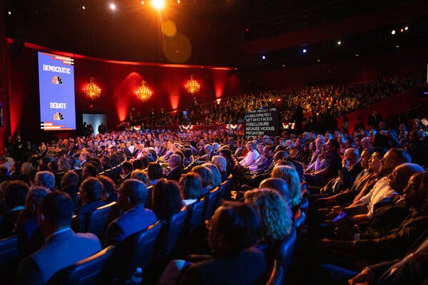 The two operatives attended the Democratic Presidential Debate in Las Vegas in February 2020.