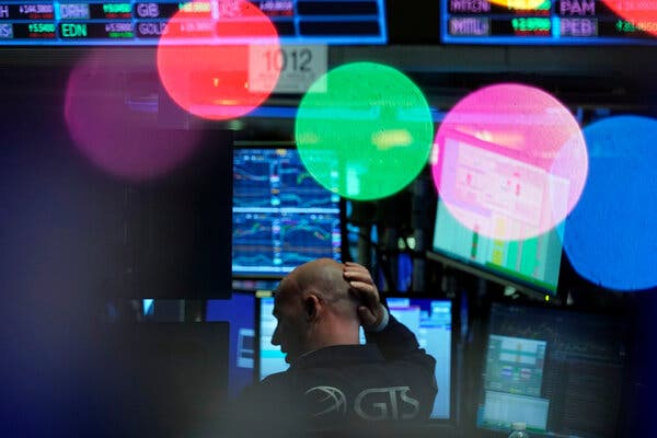 The New York Stock Exchange on Friday, where stocks dropped on initial news of a new Covid-19 variant discovered in southern Africa.