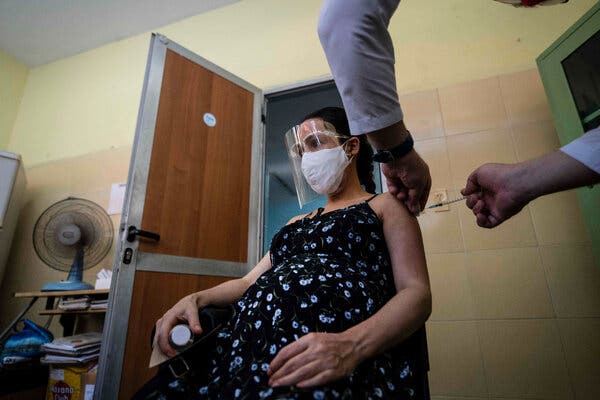 A pregnant woman receiving a dose of Covid vaccine in Havana last month.
