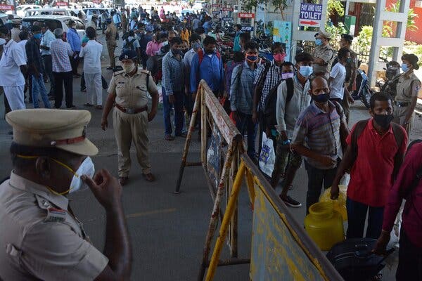 Stranded migrant workers in India waited to board a train to return to their home regions on Monday after a lockdown was imposed in Chennai.
